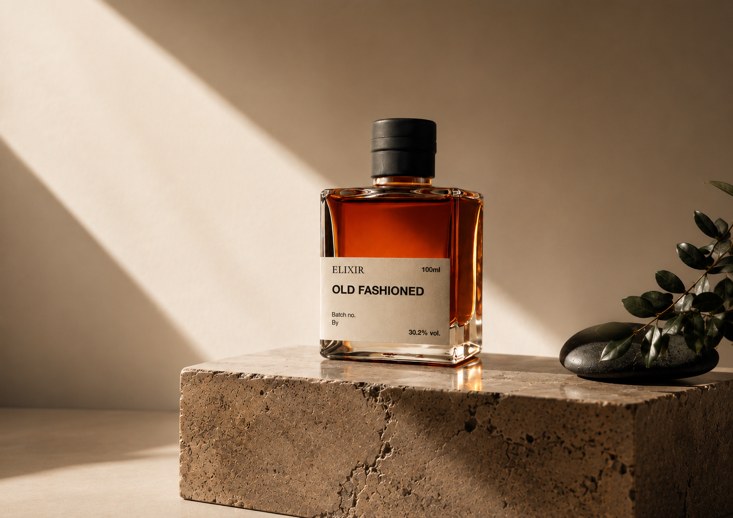 Elixir Bar Old Fashioned bottle on a travertine plinth with soft directional light